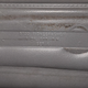 Text found under the armrest/door handle that screws to Brian’s 1996 Jeep Cherokee’s passenger-side door panel.